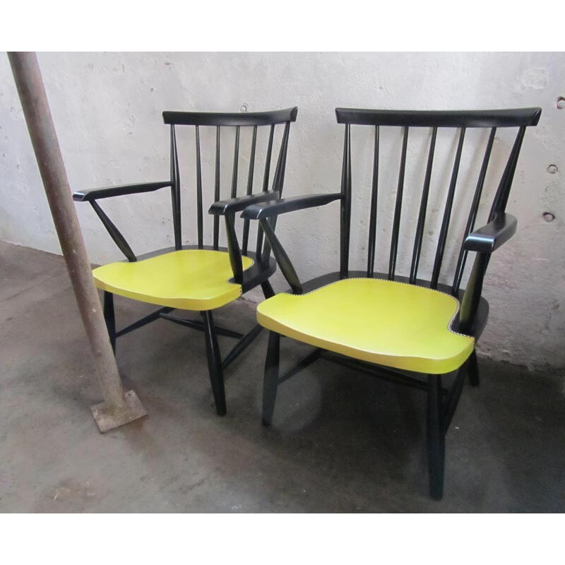 Pair of armchairs in wood and yellow leatherette - 1950s