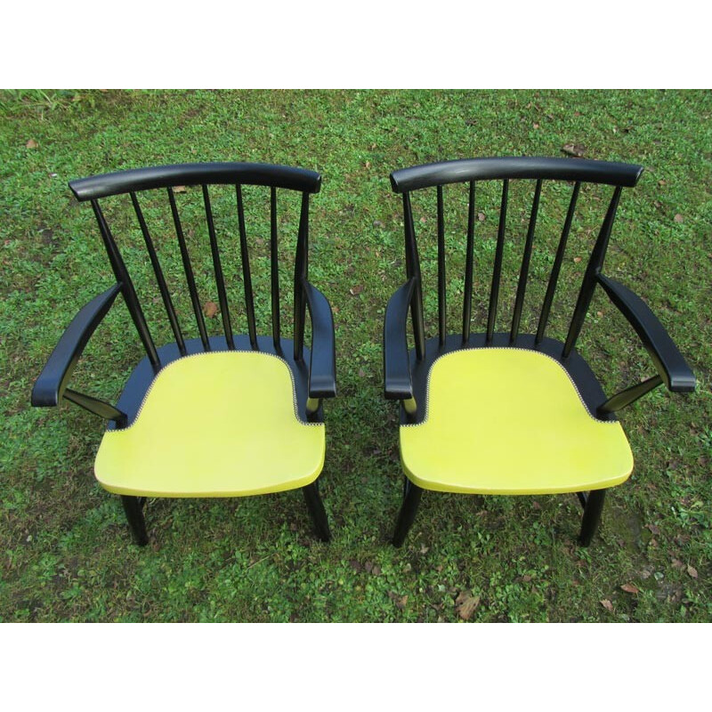 Pair of armchairs in wood and yellow leatherette - 1950s