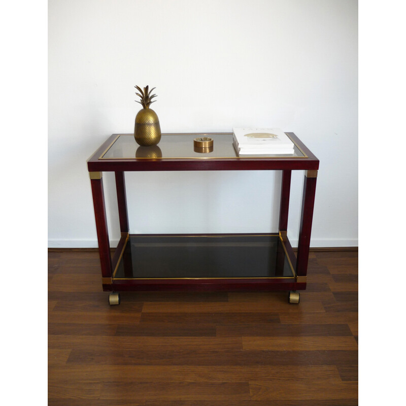 Maison JANSEN, console, neoclassical style rolling table in mahogany and brass. Circa 1970