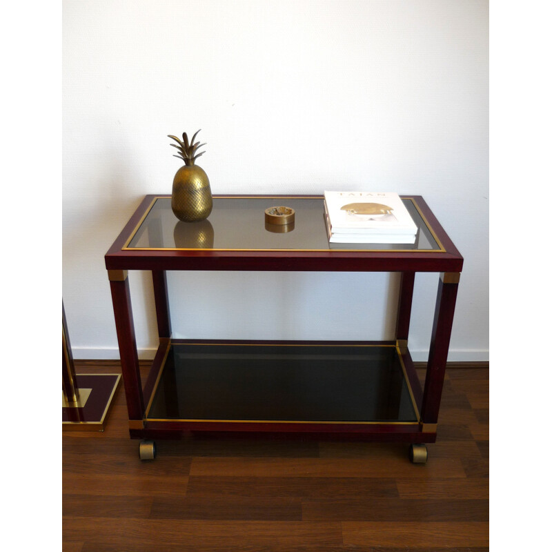 Maison JANSEN, console, neoclassical style rolling table in mahogany and brass. Circa 1970