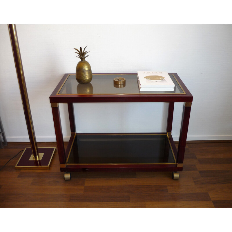 Maison JANSEN, console, neoclassical style rolling table in mahogany and brass. Circa 1970