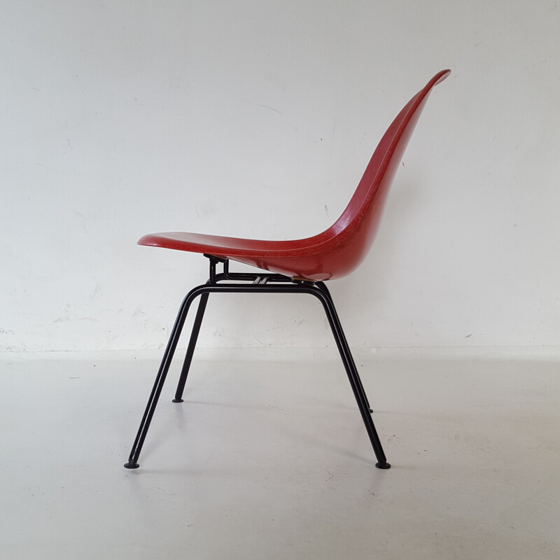 Vintage red chair by Charles and Ray Eames - 1960s