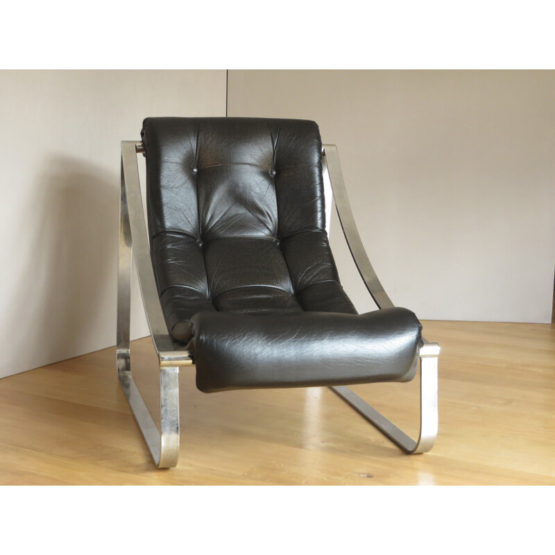 Lounge armchair in steel and black leatherette - 1970s