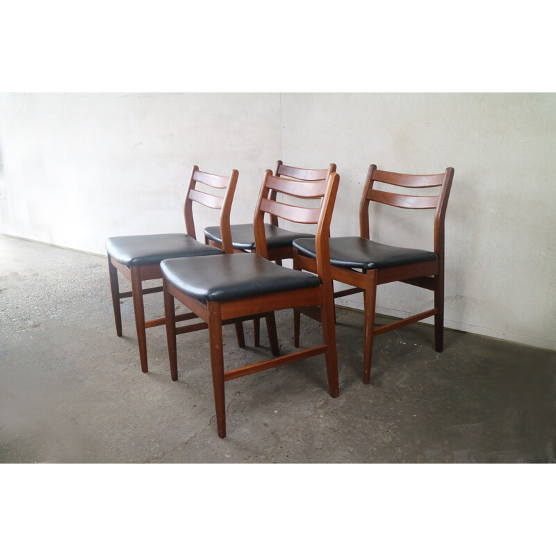 Set of 4 british dining chairs in black vinyl - 1970s