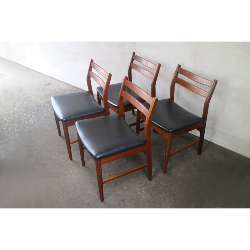 Set of 4 british dining chairs in black vinyl - 1970s