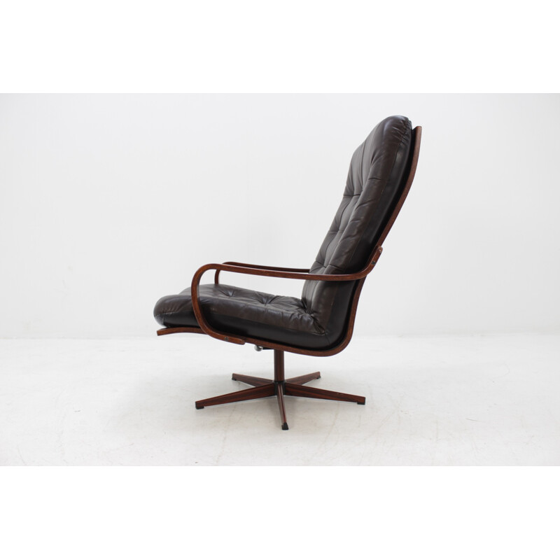 Scandinavian vintage swivel chair in leather - 1970s