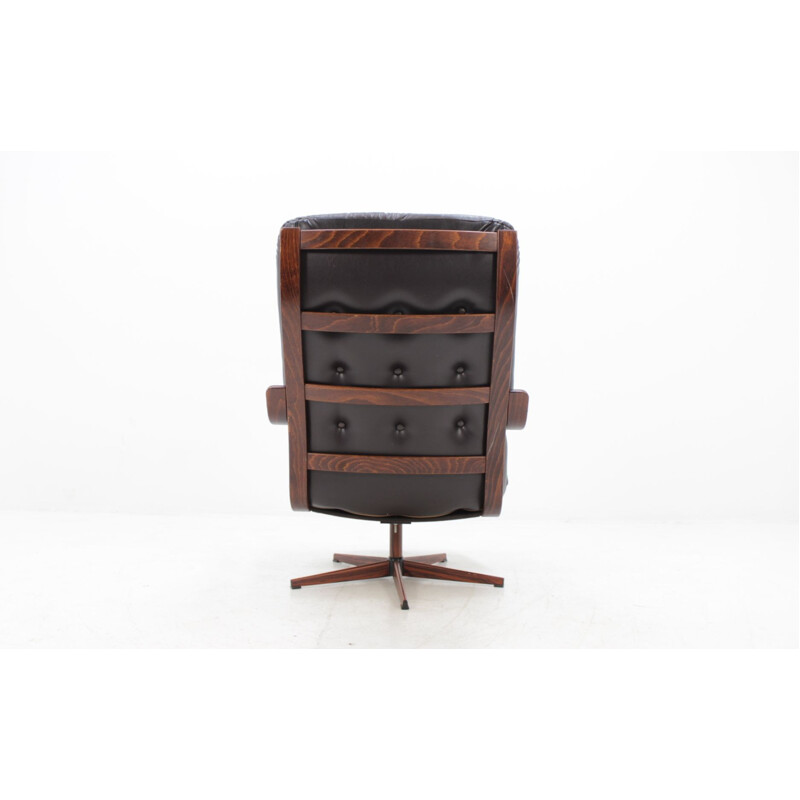 Scandinavian vintage swivel chair in leather - 1970s