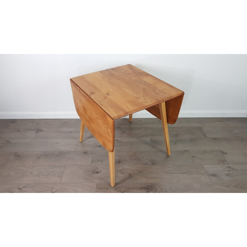 Vintage drop leaf dining table by Ercol - 1960s