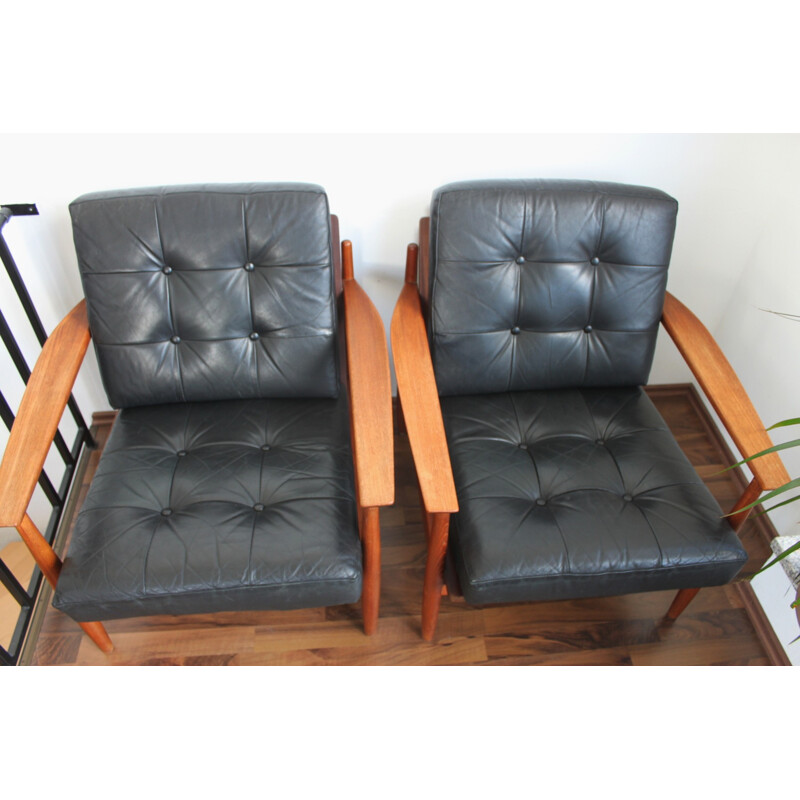 Set of 2 teak and leather easy chairs - 1960s