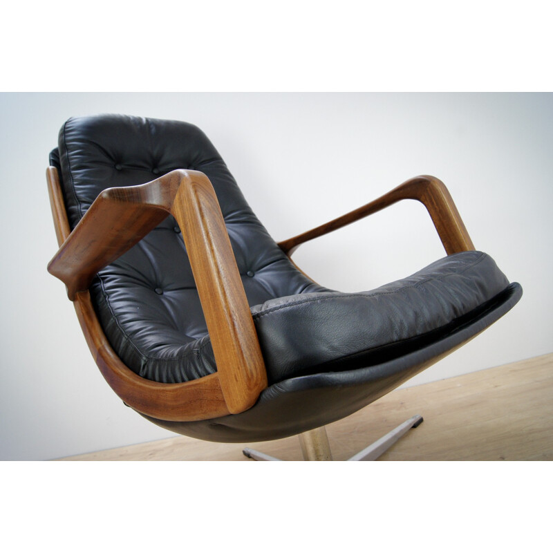 Chaise vintage pivotante en cuir et en teck - 1960