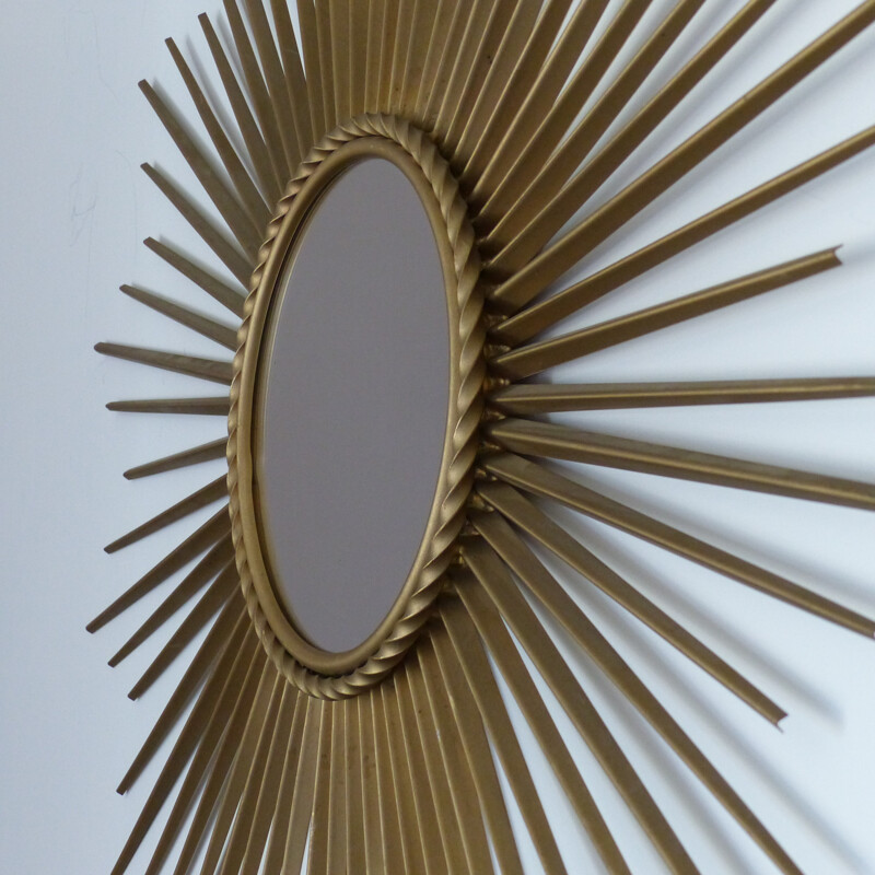 Grand miroir soleil en métal doré par Chaty Vallauris - 1950