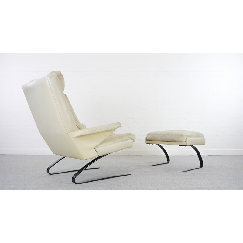Vintage fauteuil met lederen voetenbank van COR - 1970