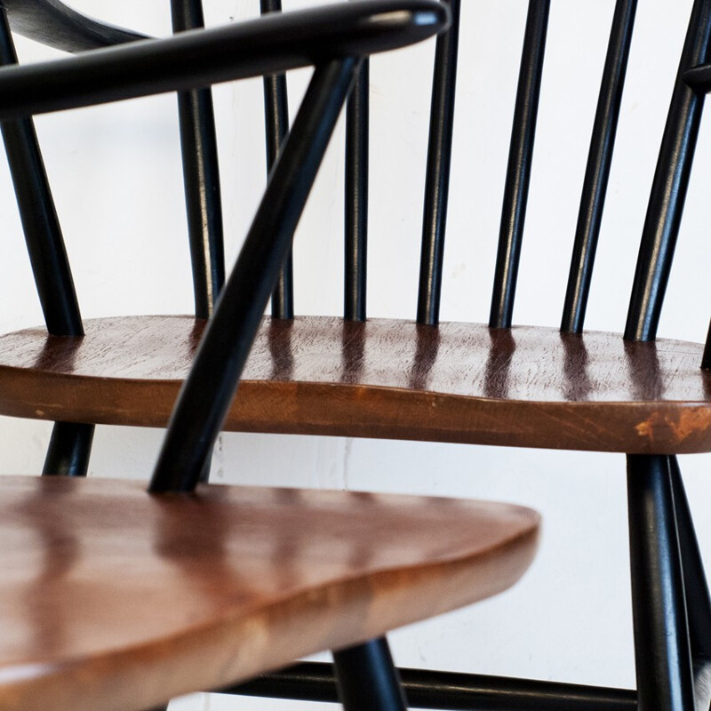 Paire fauteuils en teck et bois laqué noir - 1950