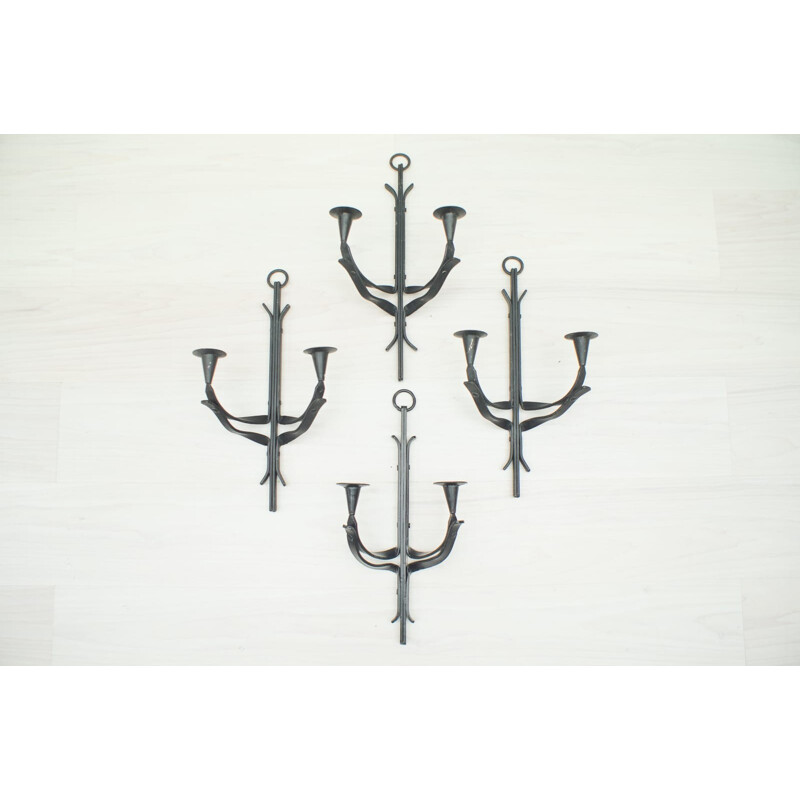 Suite of 4 hand forged vintage iron wall candle holders, France 1950