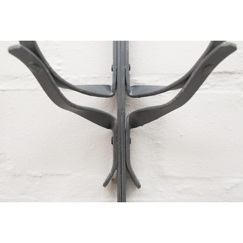 Suite of 4 hand forged vintage iron wall candle holders, France 1950