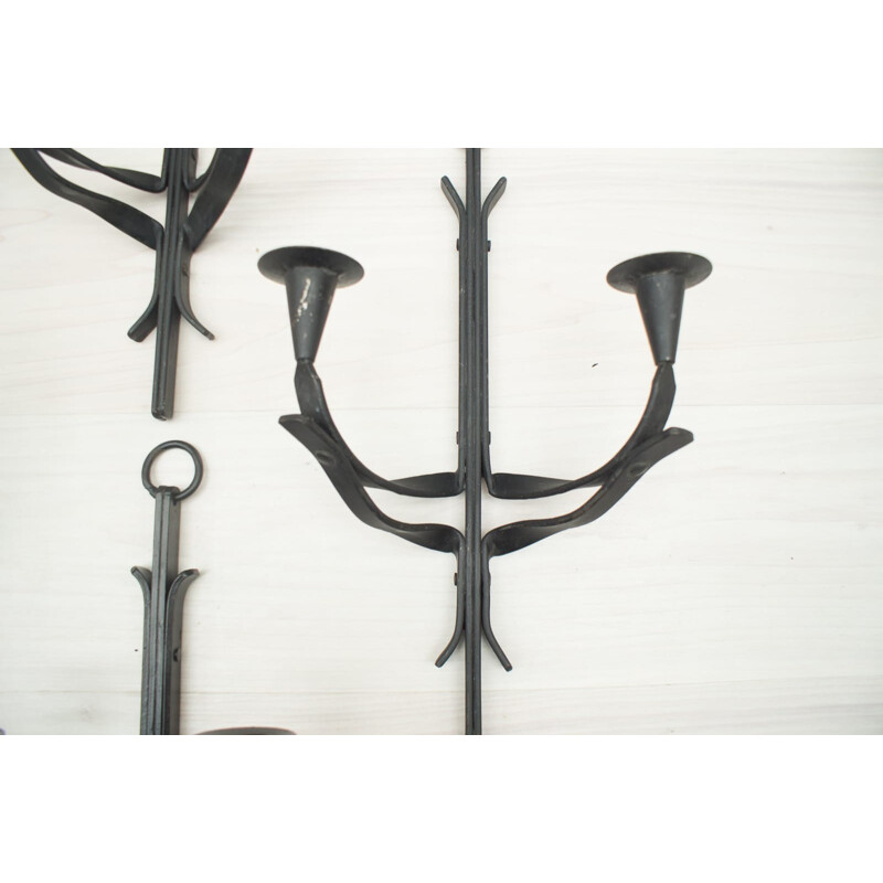 Suite of 4 hand forged vintage iron wall candle holders, France 1950