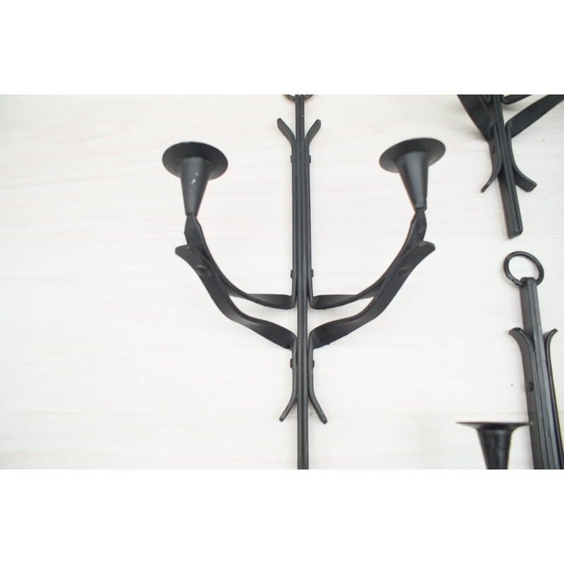 Suite of 4 hand forged vintage iron wall candle holders, France 1950