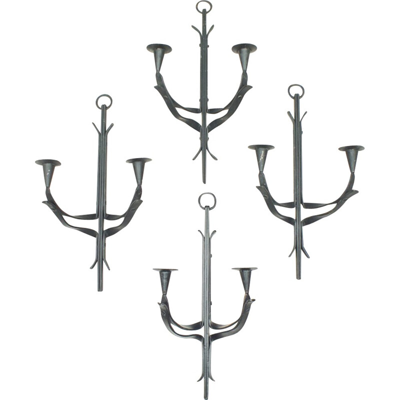 Suite of 4 hand forged vintage iron wall candle holders, France 1950