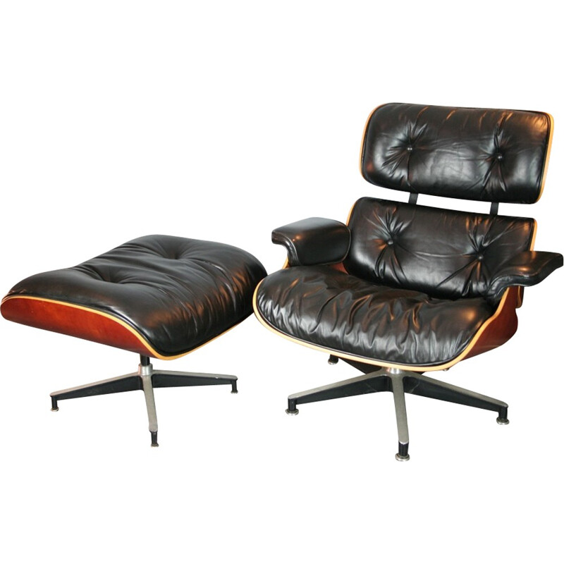 Vintage black lounge chair and ottoman in cherrywood by Eames for Herman Miller - 2000s