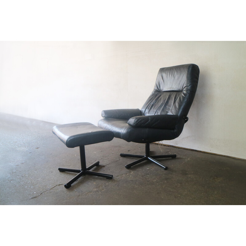 Vintage danish black leather reclining armchair and footstool - 1970s