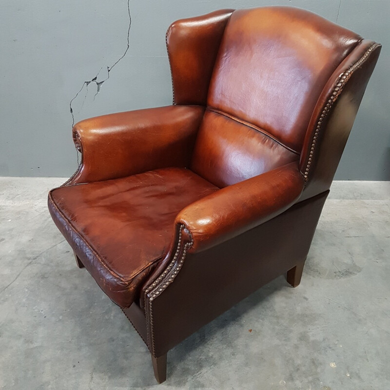 Fauteuil vintage à oreilles en cuir de mouton par Muylaert - 1970