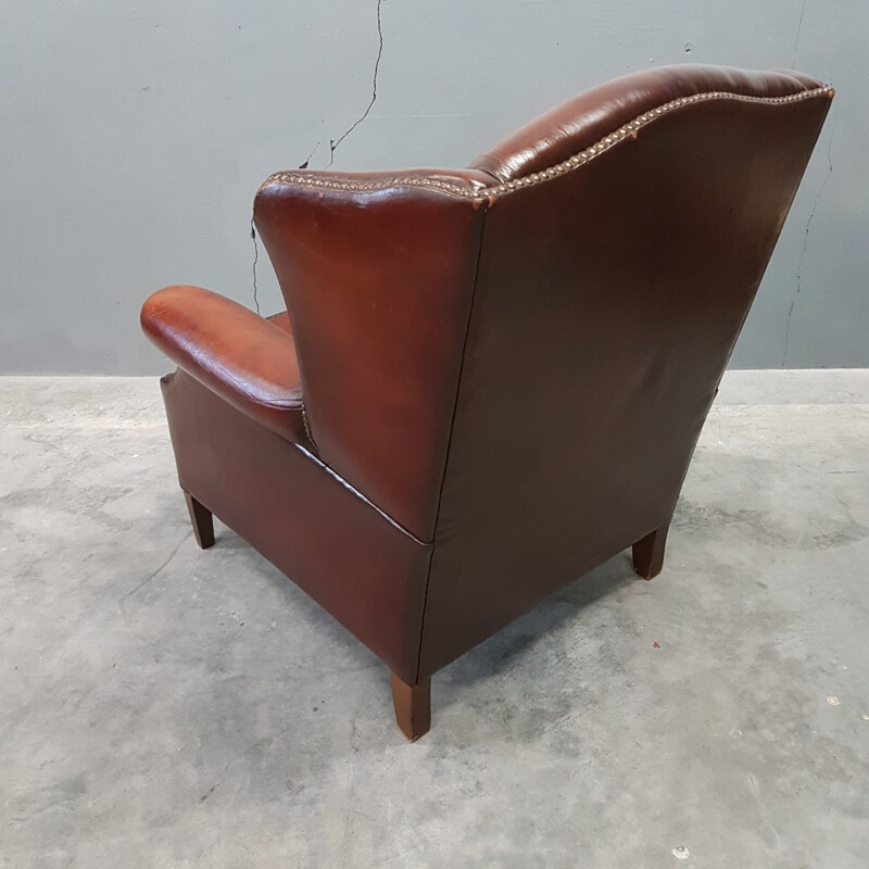 Fauteuil vintage à oreilles en cuir de mouton par Muylaert - 1970