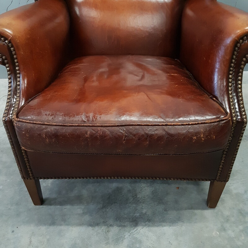 Fauteuil vintage à oreilles en cuir de mouton par Muylaert - 1970