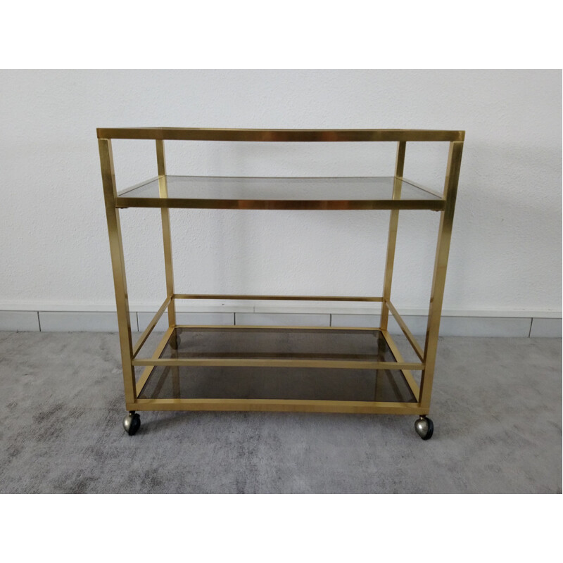 Vintage rolling trolley in golden brass and smoked glass - Italian design - 1970s