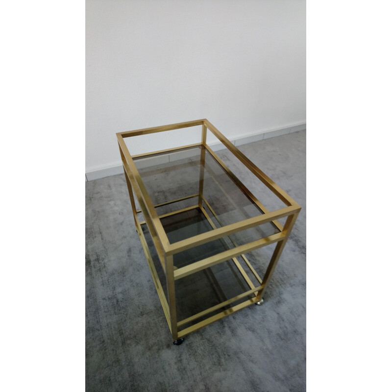 Vintage rolling trolley in golden brass and smoked glass - Italian design - 1970s