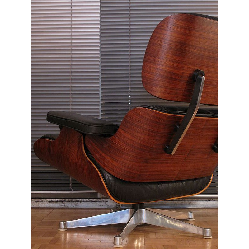 Vintage black lounge chair in leather and rosewood by Eames for Vitra - 1980s