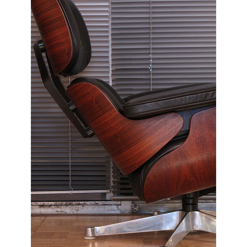 Vintage black lounge chair in leather and rosewood by Eames for Vitra - 1980s