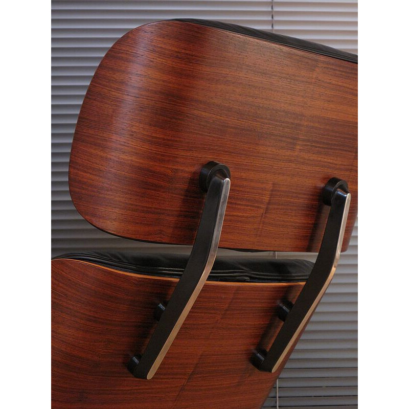 Vintage black lounge chair in leather and rosewood by Eames for Vitra - 1980s