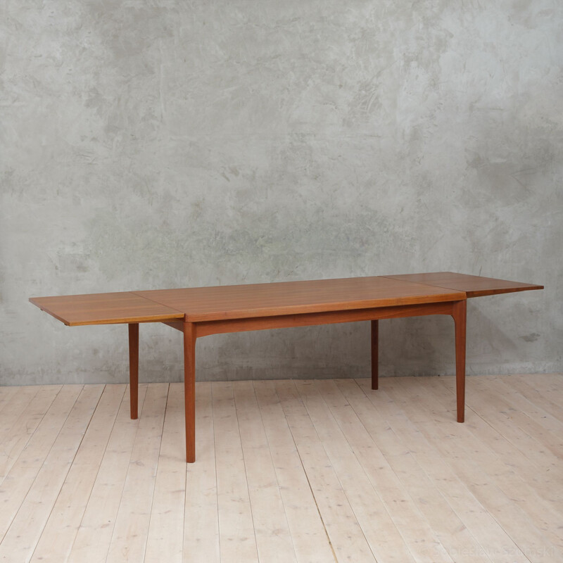 Large teak dining table by Henning Kjaernulf - 1960s