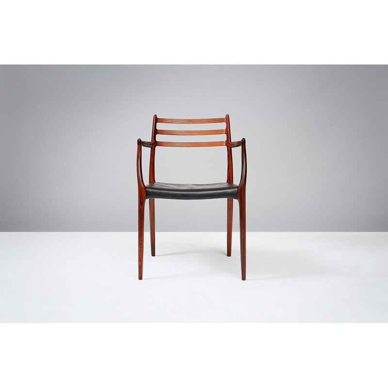 Vintage rosewood "Model 62" armchair - 1960s