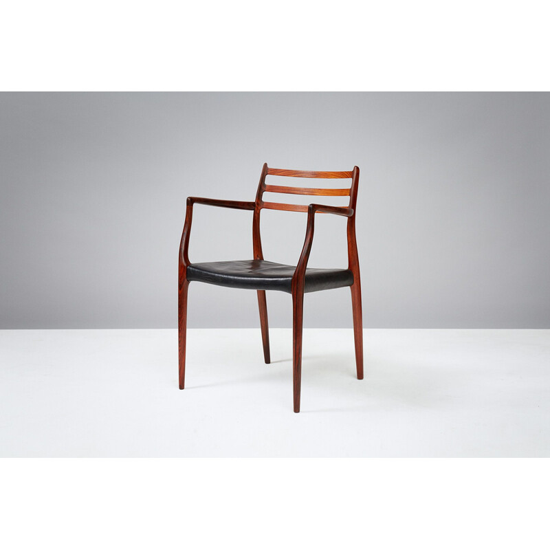 Vintage rosewood "Model 62" armchair - 1960s