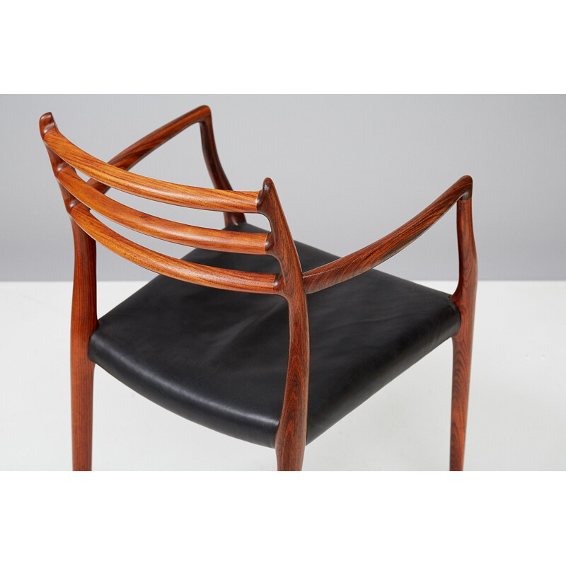 Vintage rosewood "Model 62" armchair - 1960s