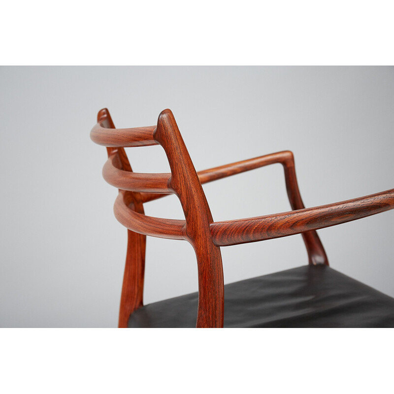 Vintage rosewood "Model 62" armchair - 1960s