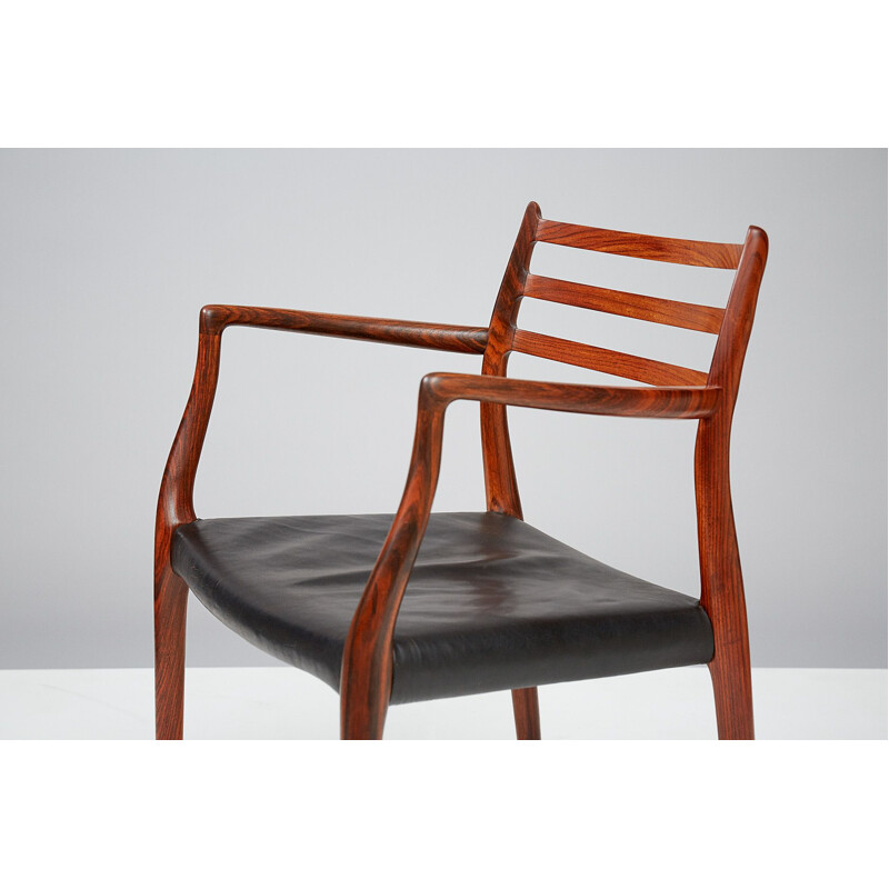 Vintage rosewood "Model 62" armchair - 1960s