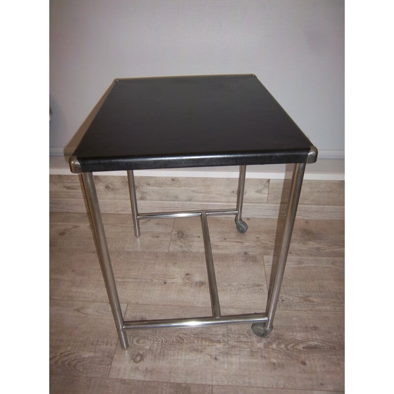 Vintage side table in steel with wheels