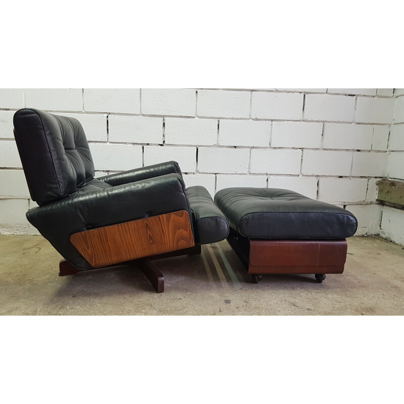 Fauteuil Cinova vintage en cuir & ottoman en palissandre 