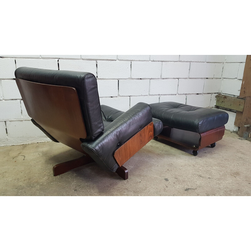 Vintage Cinova lounge chair in leather & ottoman in rosewood 