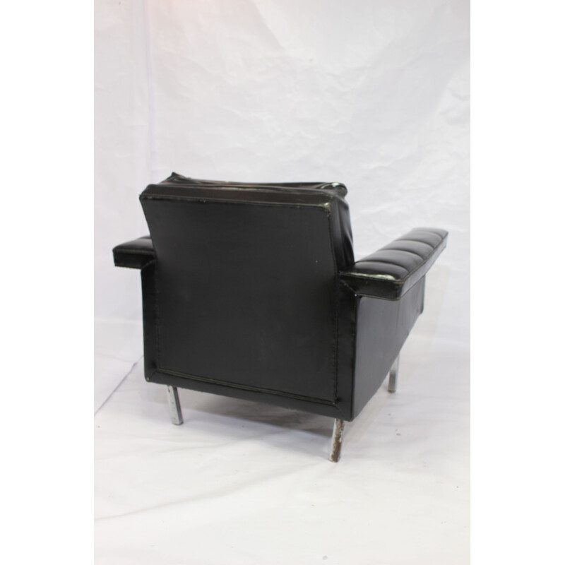 Vintage easy chair in leather and chromed metal 