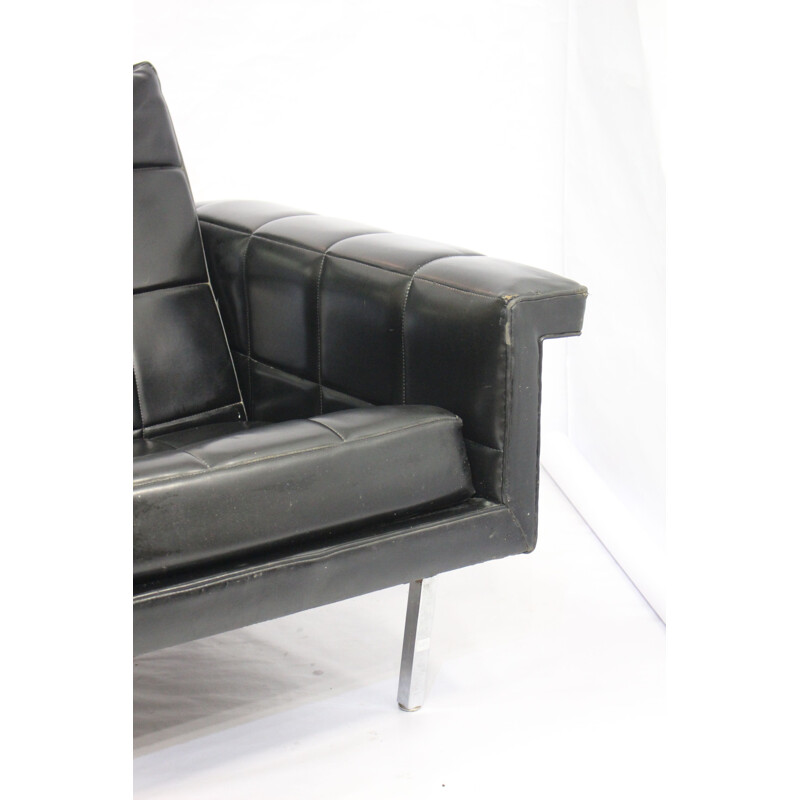 Vintage easy chair in leather and chromed metal 
