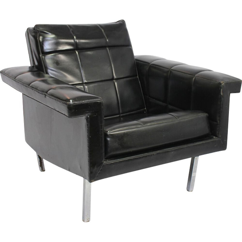 Vintage easy chair in leather and chromed metal 