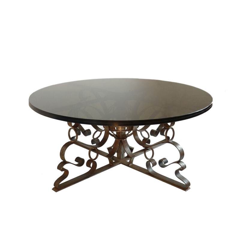 Vintage round coffee table in forged steel and smoked glass