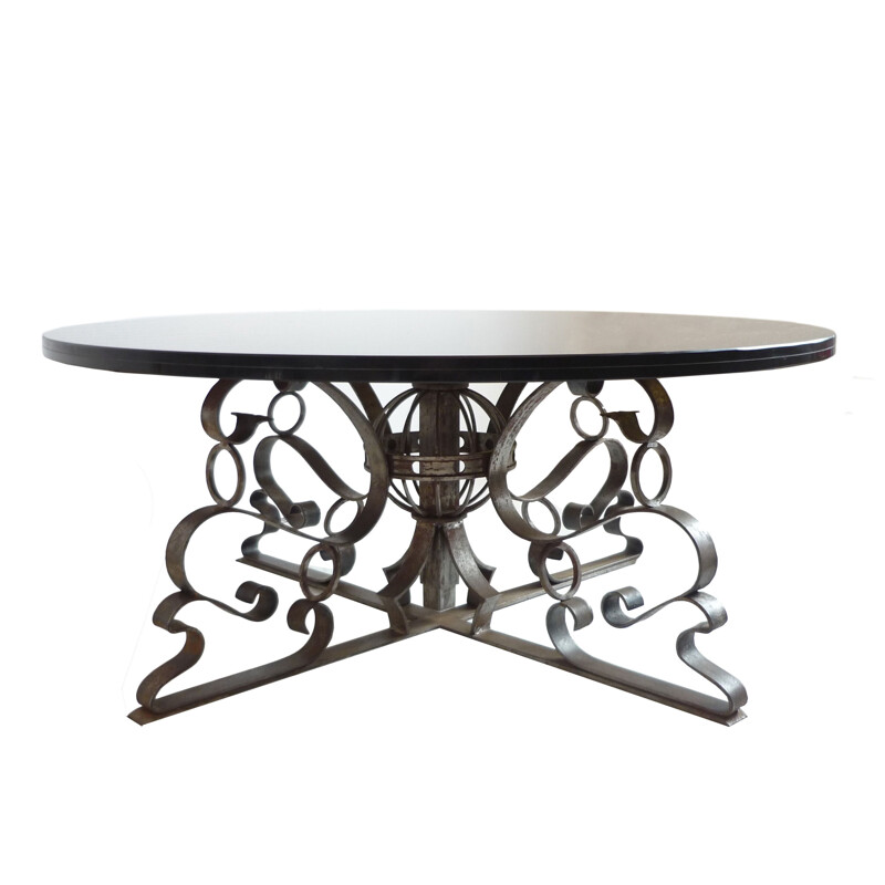 Vintage round coffee table in forged steel and smoked glass