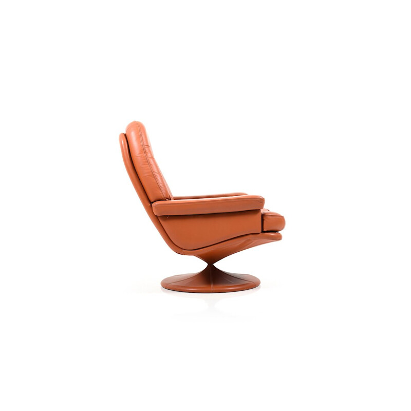 Vintage Scandinavian swivel lounge chair in leather