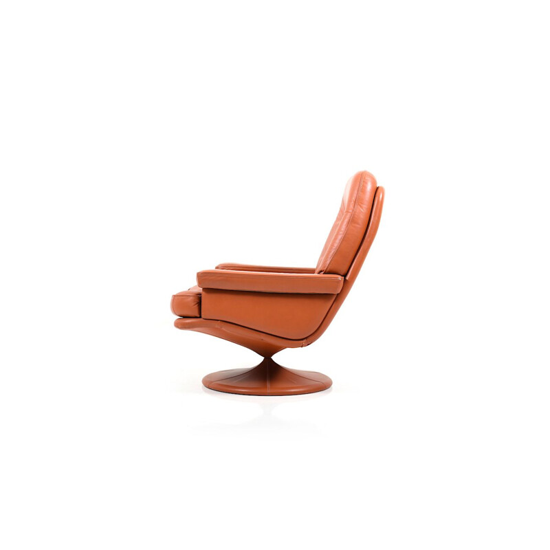 Vintage Scandinavian swivel lounge chair in leather