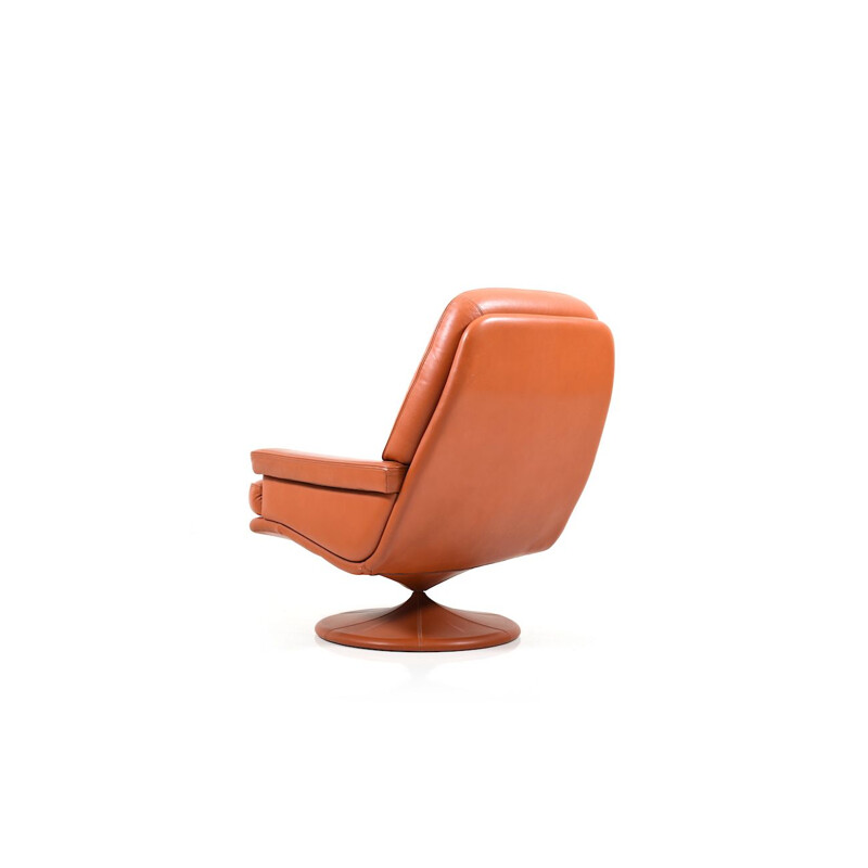 Vintage Scandinavian swivel lounge chair in leather