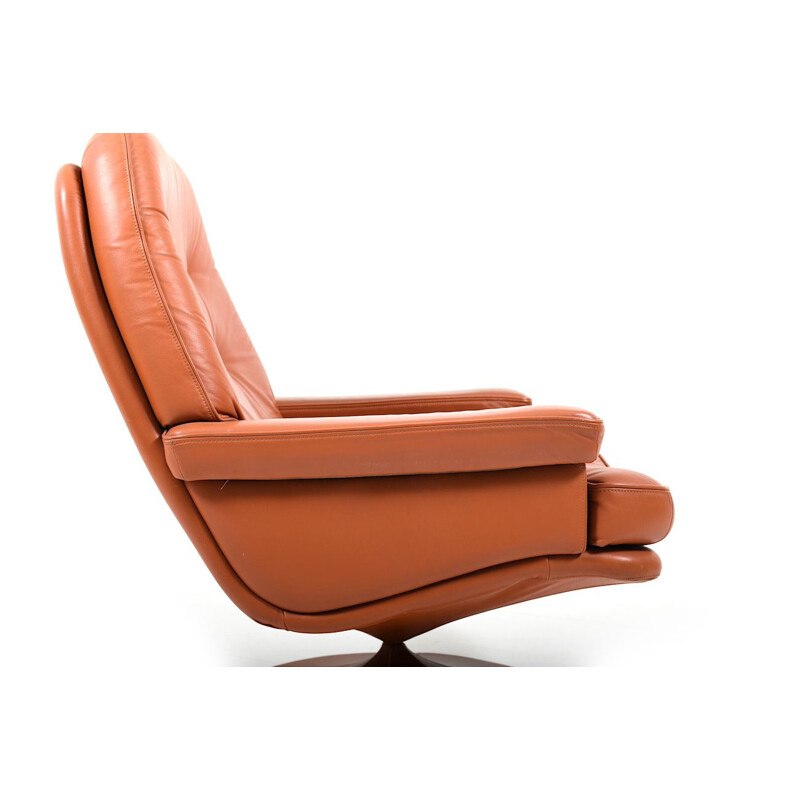 Vintage Scandinavian swivel lounge chair in leather